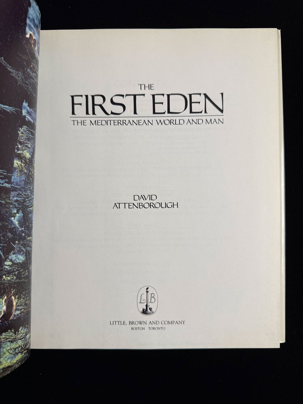 Book cover of 'The First Eden' by David Attenborough with a black background