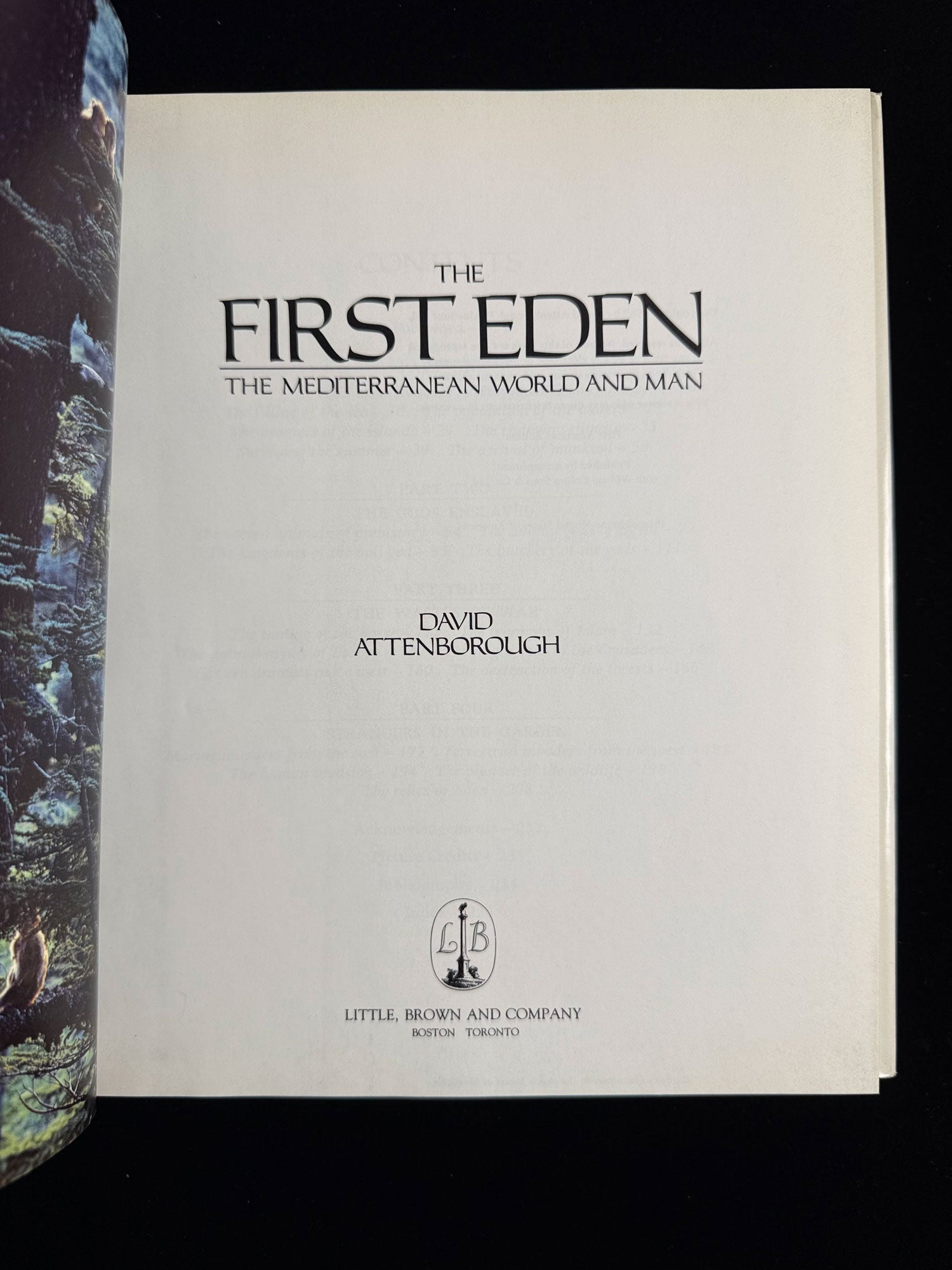 Book cover of 'The First Eden' by David Attenborough with a black background
