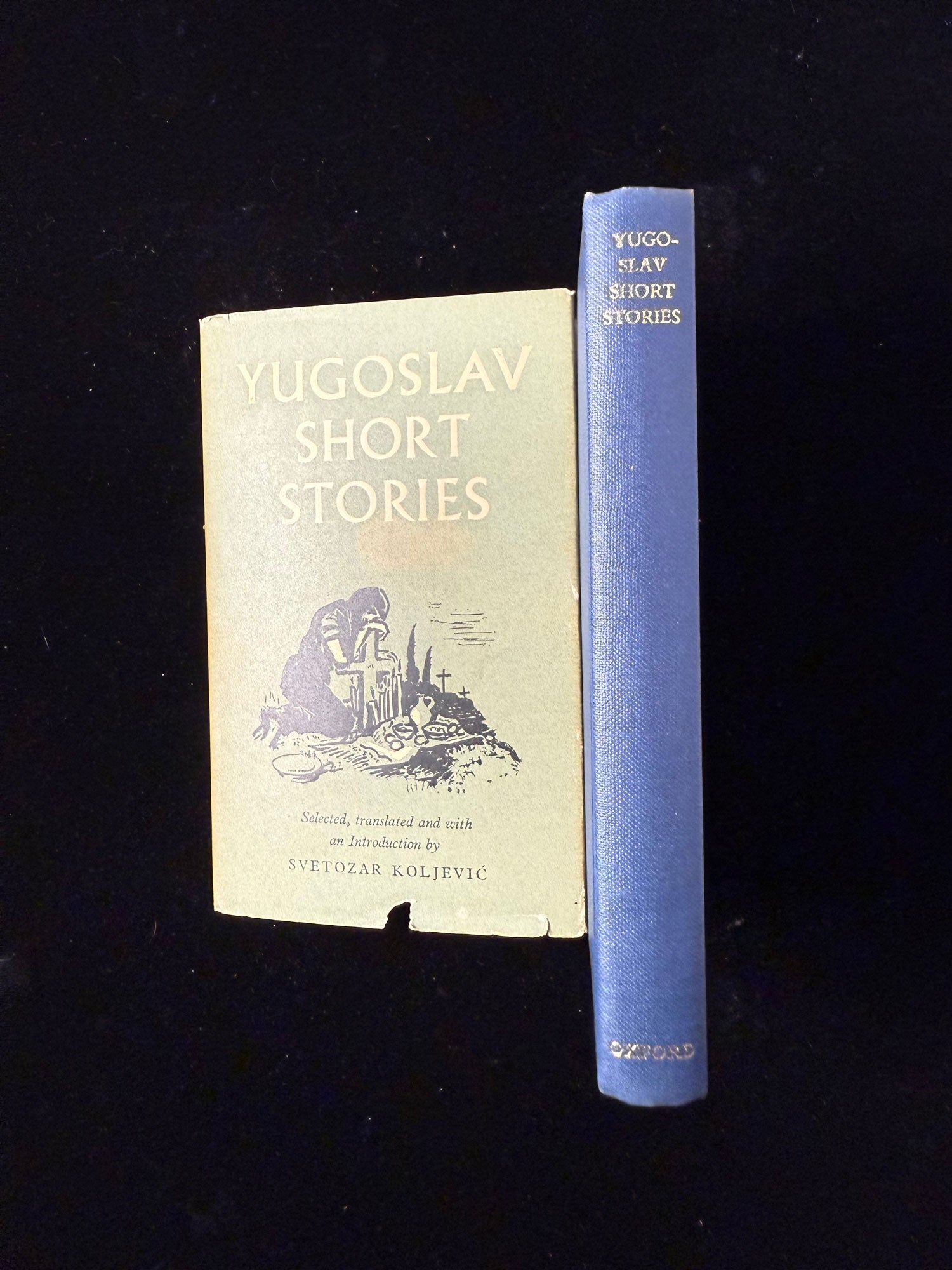 Blue spine and cover with small tears